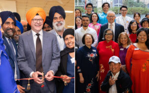 Group at a ribbon-cutting ceremony with diverse attendees, including Sikh men in turbans, celebrating a multicultural event.