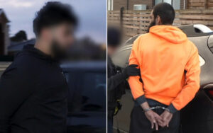 Person in an orange hoodie is handcuffed behind the back as another man stands nearby; both appear outdoors near a car, with blurred faces for privacy.