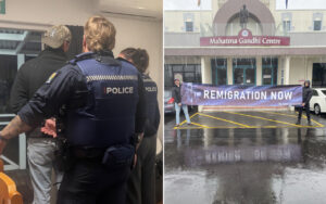 Left: police officers in tactical gear escorting a man indoors, back view. Right: two protesters outside the Mahatma Gandhi Centre holding a banner that reads 'REMIGRATION NOW' in wet weather.