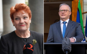Left: smiling woman with short red hair in a dark blazer, near a News microphone. Right: man in a dark suit and blue tie at a podium with a fuzzy microphone, flags in the background.