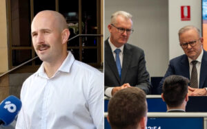 Man with a shaved head and mustache being interviewed outdoors on the left; a blue microphone is visible. On the right, two suited executives sit at a conference table addressing an audience.
