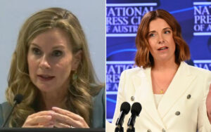 Two women speaking at podiums: left a blonde woman with hands folded, right a red-haired woman in a white blazer at microphones against a blue backdrop.