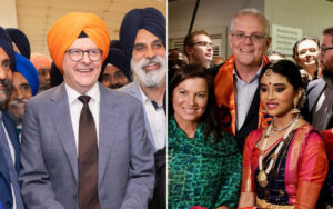 Group photo at a celebration; left side shows a man in a gray suit with an orange turban among Sikh attendees, smiling.