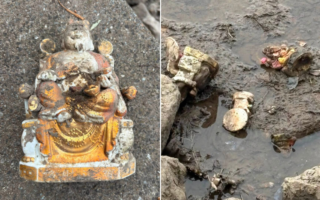 Split image: left shows a small, weathered orange-and-white Buddha statue seated on a rough pavement; right shows scattered, broken statue fragments in muddy ground.